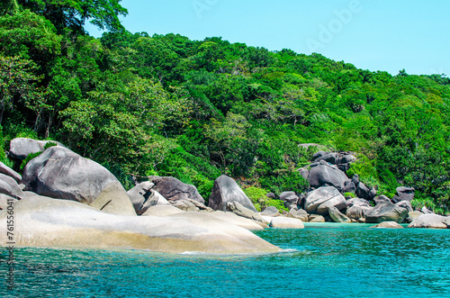 Tropical islands of ocean blue sea water and white sand beach at Similan Islands with famous Sail Rock, Phang Nga Thailand nature landscape