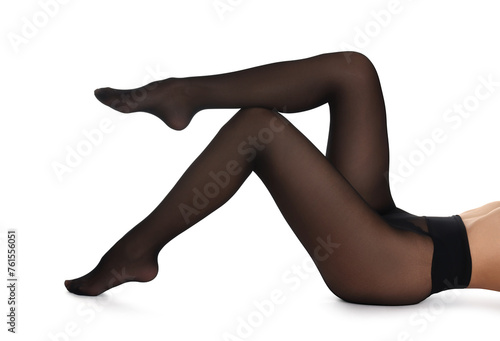 Woman with beautiful long legs wearing black tights on white background  closeup