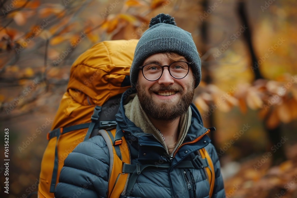 Hiker - man hiking in forest. Caucasian male model outdoors in nature. Hiker - man hiking in forest. Caucasian male model outdoors in nature.