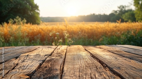 Golden Sunset Over a Rustic Wooden Table in a Tranquil Field