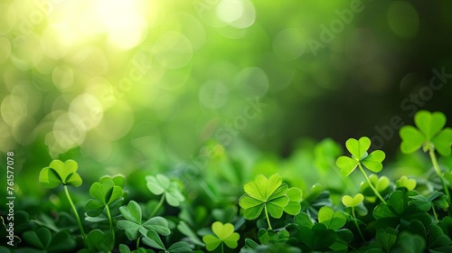 Seamless St. Patrick's Day background with blurred four-leaf clover leaves on green, copy space for text