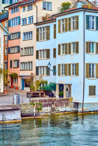 Old residential houses on the riverside Schipfe street, Zurich, Switzerland photo