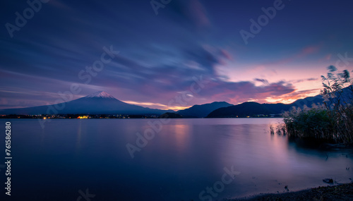 Landscape image of Mt. Fuji over Lake Kawaguchiko at sunset in Fujikawaguchiko  Japan.
