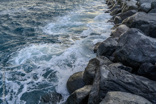 Beautiful seascape with pebble beach and sea waves of Madeira, Portugal