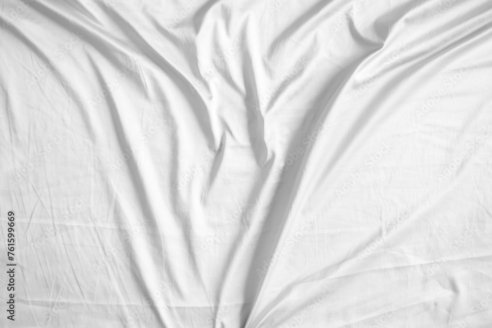 Obraz premium Abstract white wrinkled bedding sheet fabric texture background