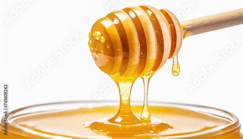 Natural honey dripping from dipper on white background. high quality photo