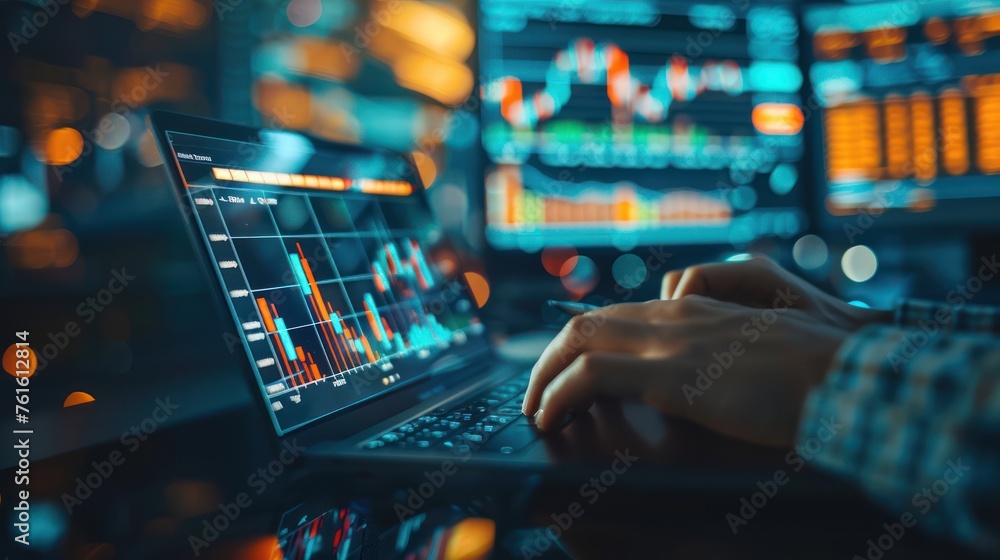 Analyst working with digital financial business data graph showing investment technology Analyst working with digital financial business data graph showing investment technology