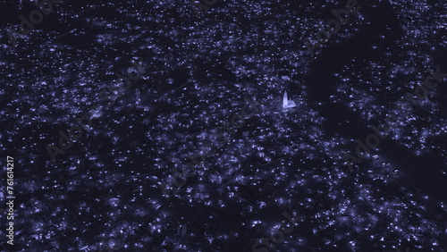 3D city model of Cologne at night. A sea of lights in the darkness. Aerial view with the illuminated Cologne Cathedral in the centre.