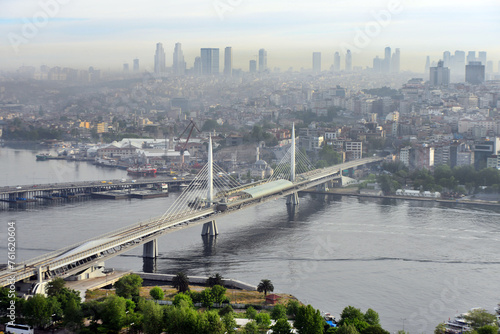 Istanbul metro bridge and the city skyline in the background. Golden Horn, Istanbul, Turkey.