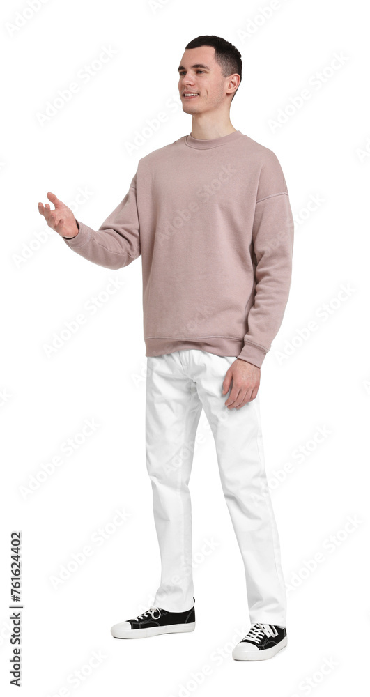 Handsome young man greeting someone on white background Handsome young man greeting someone on white background