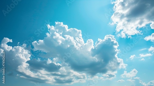 A peaceful blue sky with only a small white cloud visible    AI generated illustration photo