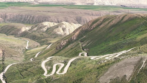 Toguz-Toro pass in Jalal-Abad region in western Kyrgyzstan. The Tien Shan and Pamir mountain systems. The highlands. View of the serpentine from the pass. 4К photo