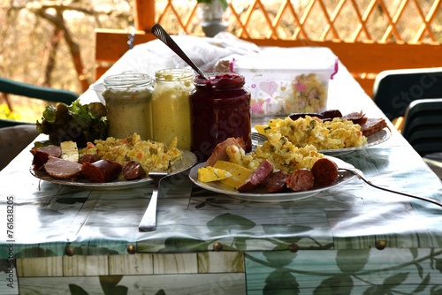 Obraz na płótnie Easter table with salad, eggs, ham, sausage, beetroot and horseradish w salonie