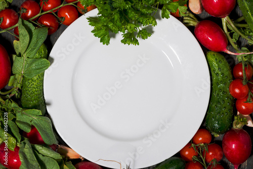 plate, background for text with fresh seasonal vegetables, closeup