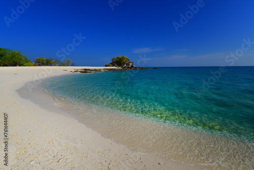 the exotic peaceful tropical island beach. the white sand and clear turquoise sea.