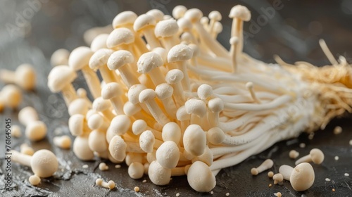Enoki mushroom on wooden table for cooking photo