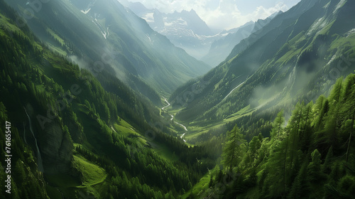 Verde valle alpino por el que transcurre un rio en primavera photo