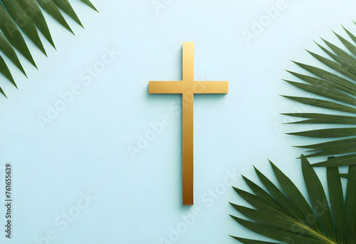 gold cross on palm leaves background