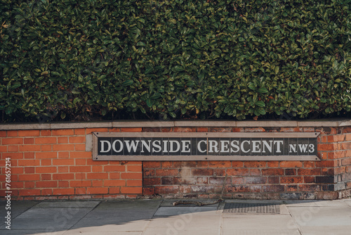 Street name sign on Downside Crescent, Belsize park, London, UK. photo