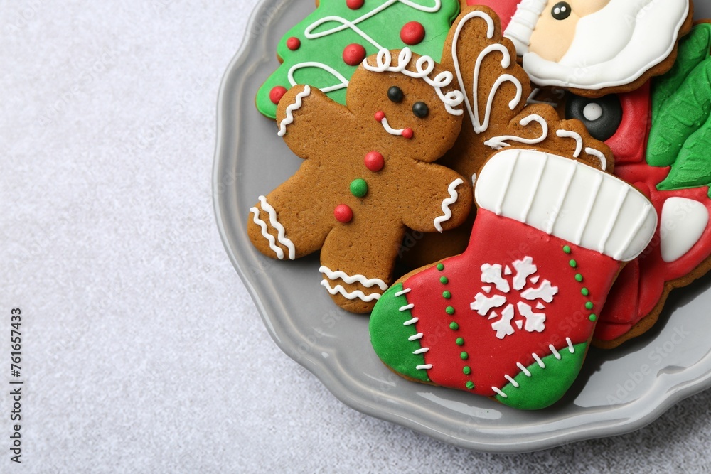 Tasty homemade Christmas cookies on light grey table, top view. Space for text