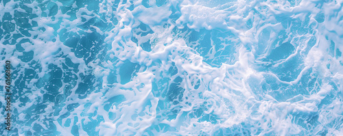 White and blue sea foam texture of fun waves. Ocean wave surface panorama with bubbles and gradient colors top view flat lay for copy space by Vita © Vita