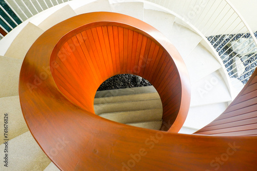 A spiral staircase shot from above,Spiral steel staircase circular staircase decoration interior,architecture design and interior concept..