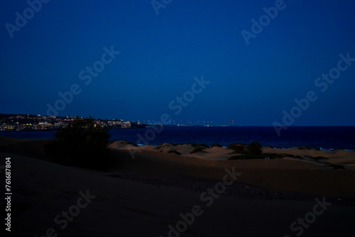 Sunset  Moon and Evening Sky over Maspalomas on Gran Canary Island Spain.