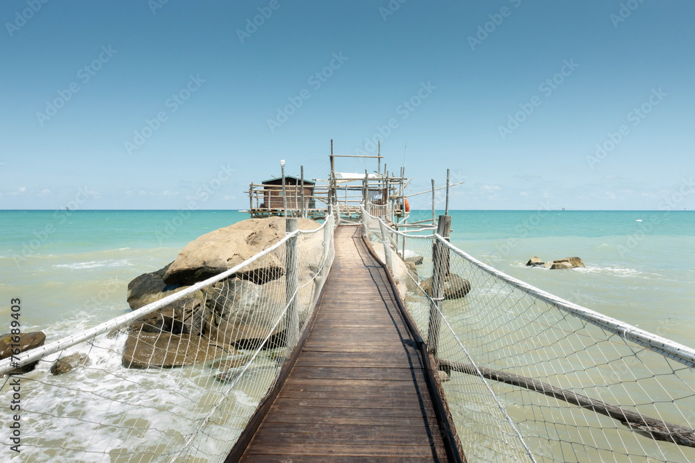 Trabocchi coast. View of the Trabocco Punta le Morge, Ancient fishing machine, Abruzzo, Italy. Trabocchi coast. View of the Trabocco Punta le Morge, Ancient fishing machine, Abruzzo, Italy.