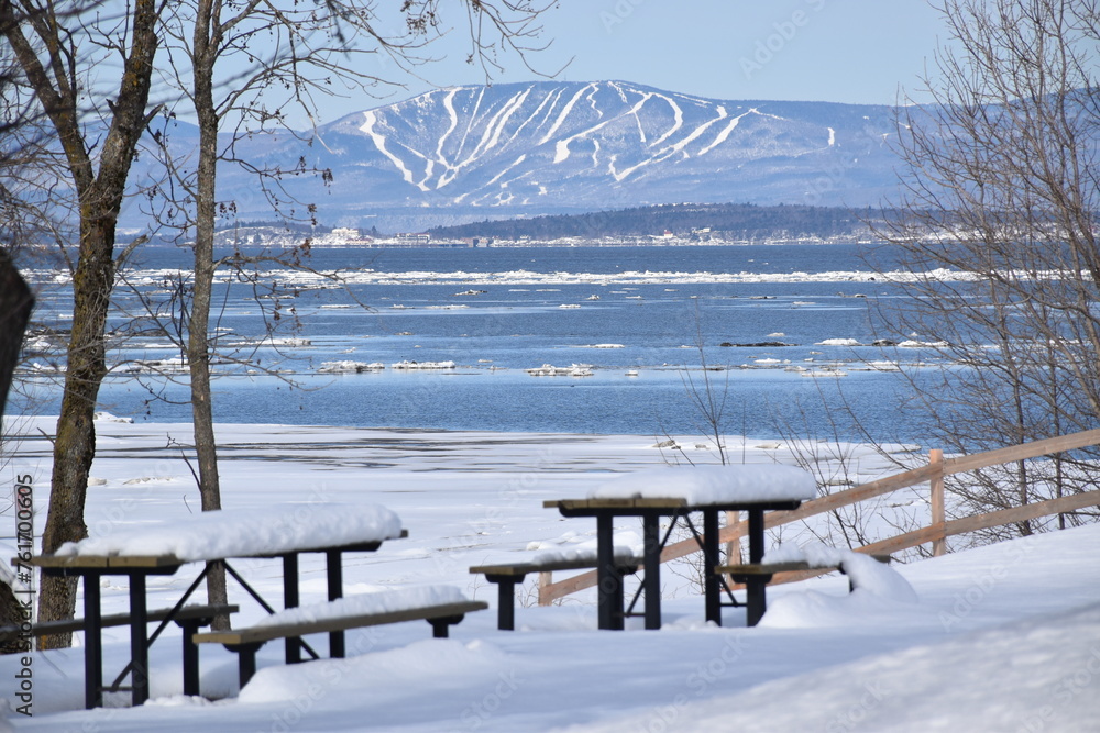 Tables in the park in winter, Montmagny, Québec, Canada