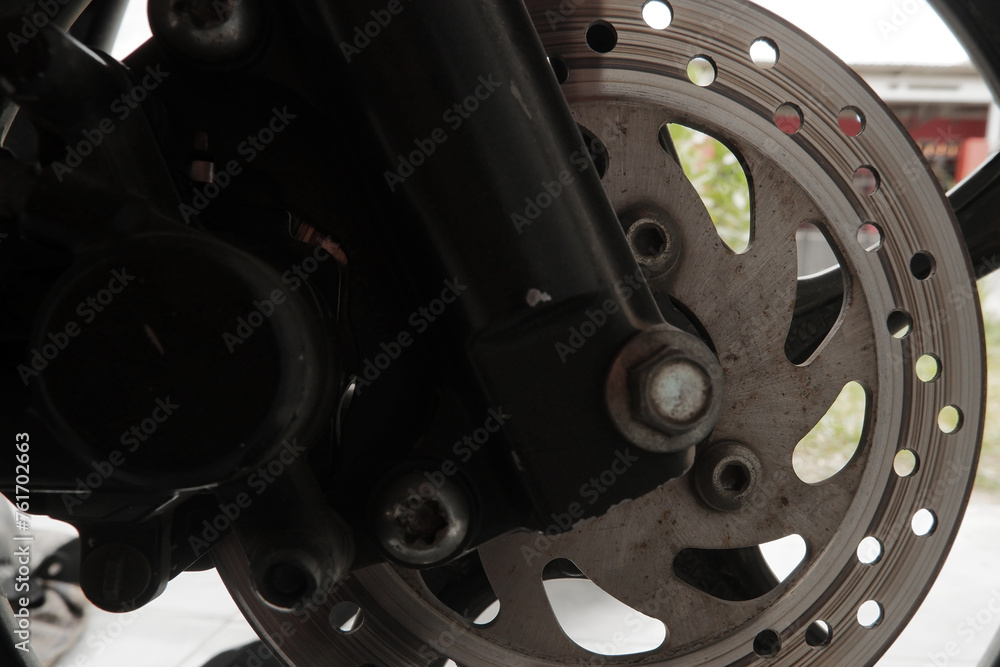 Detail photo caliper rear brake system motorcycle. part of motorcycle. Motorcycle equipment Detail photo caliper rear brake system motorcycle. part of motorcycle. Motorcycle equipment