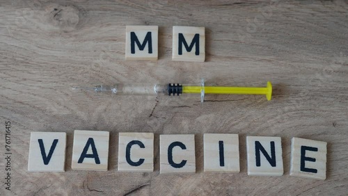 MMR vaccine concept which protects against measles, mumps, rubella, and varicella (chickenpox). 