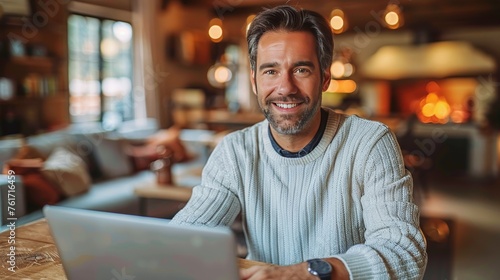 Man Sitting in Front of Laptop Computer © homeganko