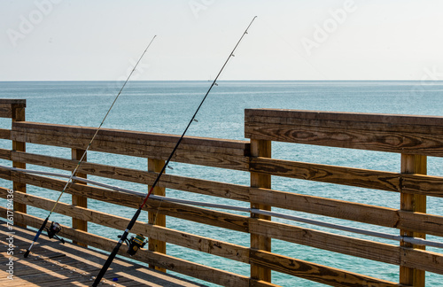 fishing poles on the pier Miami