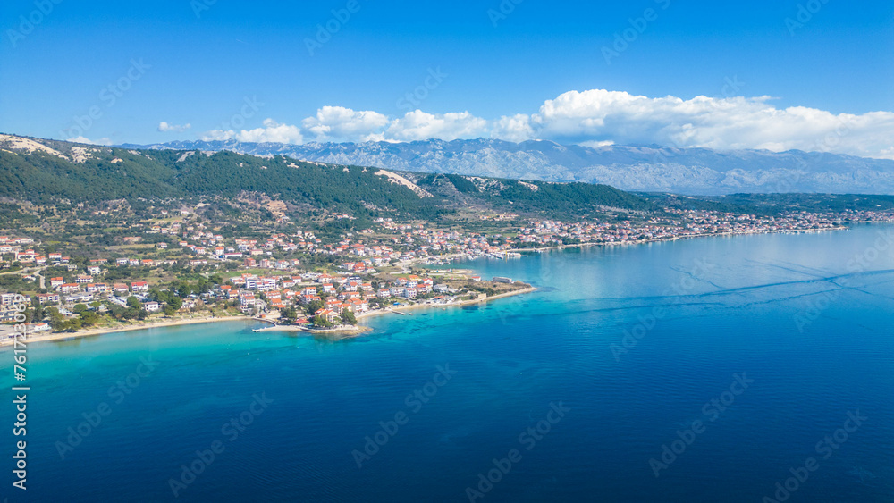 Fototapeta premium Behold the enchanting beauty of the historic town of Rab, nestled on the picturesque island of Rab in Croatia сaptured from a drone