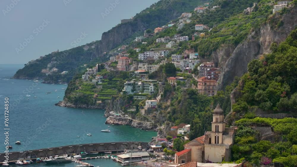 Amalfi coast view at sunrise, Italian seaside near Naples, towns of Amalfi and Atrani from above. Italian idyllic seaside resort, Amazing aerial footage of seaside old town. Amalfi coast view at sunrise, Italian seaside near Naples, towns of Amalfi and Atrani from above. Italian idyllic seaside resort, Amazing aerial footage of seaside old town.