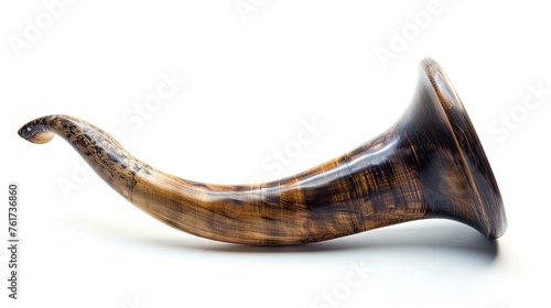 Symbolic Sound: Shofar, a traditional Jewish ram horn, isolated on a striking black background, evoking spiritual depth
