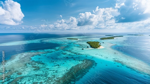 A birds eye view of an island surrounded by vast ocean waters.