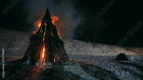 Fire, the bright flames of a burning fire burning in the night. The concept of forest fires.