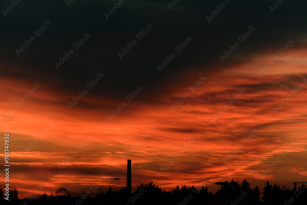 Black and red heavy sky after sunset, evening dark twilight