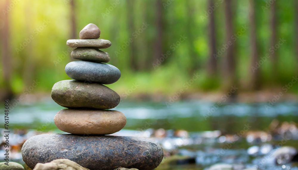 Pyramid of several flat river Zen stones. Balance and inner equilibrium. Meditative lifestyle. Natural backdrop. Pyramid of several flat river Zen stones. Balance and inner equilibrium. Meditative lifestyle. Natural backdrop.