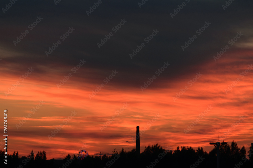 Black and red heavy sky after sunset, evening dark twilight