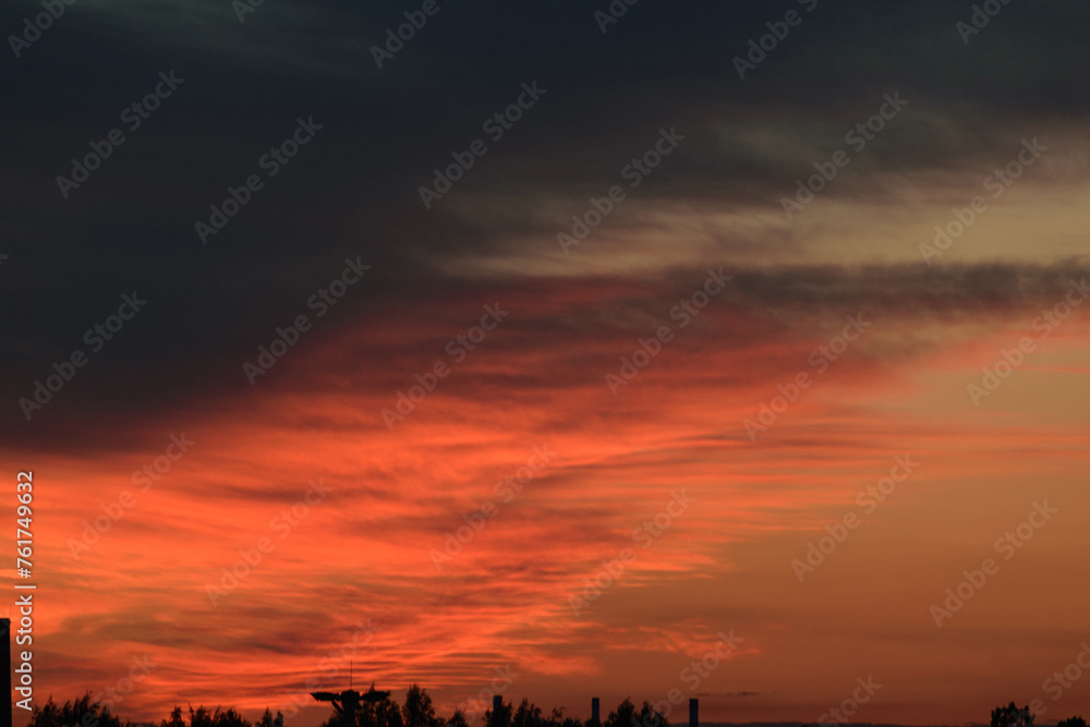 Black and red evening sky above the horizon, night twilight, dramatic atmosphere