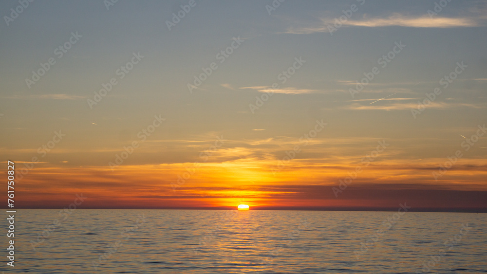 Naklejka premium Sunset over the sea in the istrian village named Umag