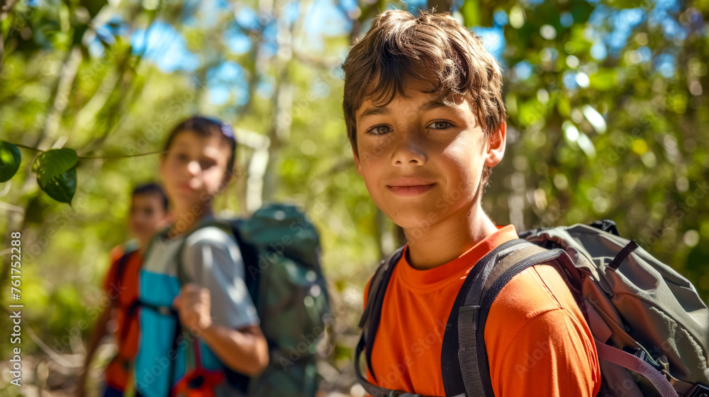 Young hikers exploring forest trail Young hikers exploring forest trail