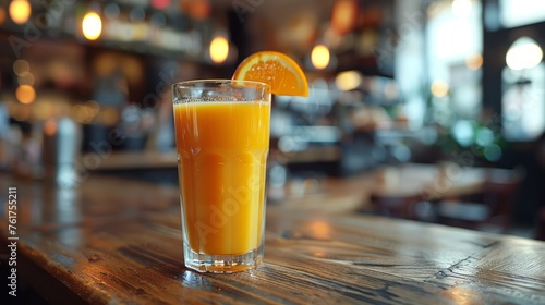 Glass of Orange Juice on Wooden Table