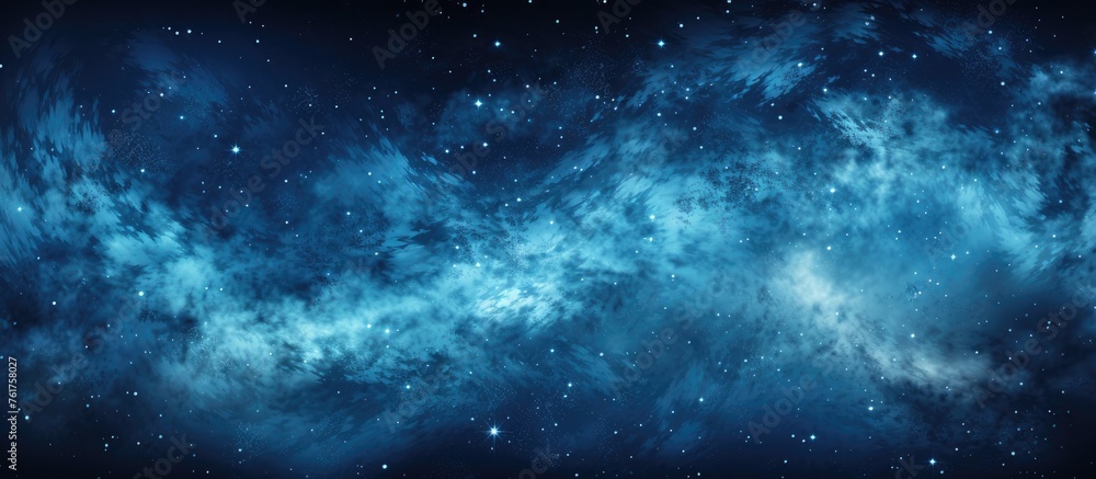 An electric blue galaxy with a multitude of stars twinkling in the background, resembling a midnight sky. The pattern of gas and darkness creates a mesmerizing meteorological phenomenon in space