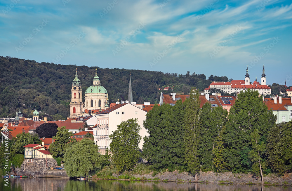 Vltava river and old buildings in Prague riverside cityscape Czech republic