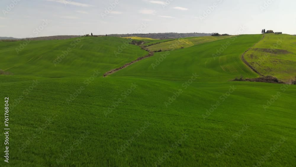 Tuscan Landscape With Rolling Hills and Lush Green Fields in Springtime Tuscan Landscape With Rolling Hills and Lush Green Fields in Springtime