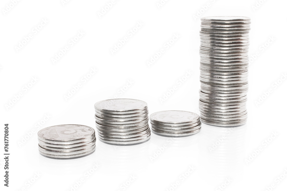 Business money graph coins on white background Business money graph coins on white background