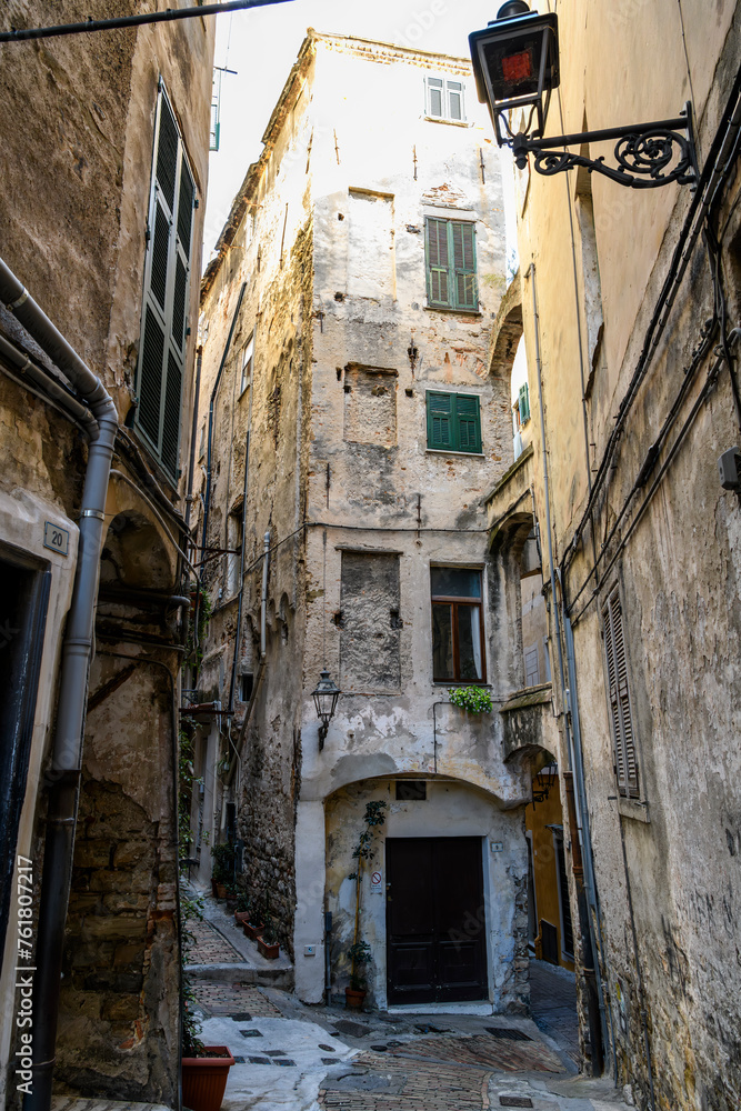 A residential area of narrow alleys, tunnels and stairs in the hillside district La Pigna di Sanremo, the medieval old town of the coastal city of Sanremo, Italy.